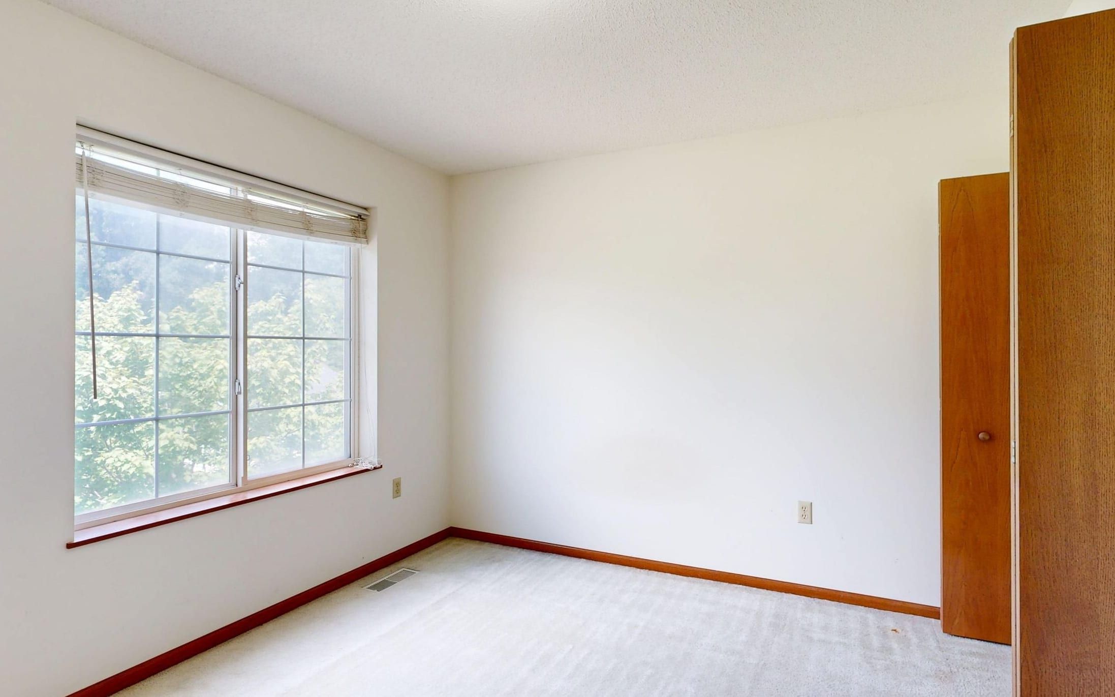 Bright white room repainted throughout with the woodwork left clean